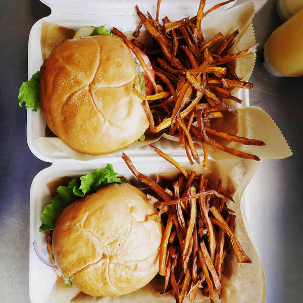 Char-grilled burger with crispy sweet potato fries Char-grilled burger with crispy sweet potato fries