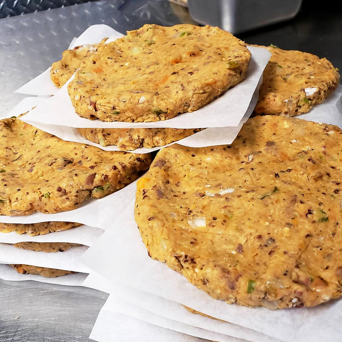 A stack of 3 scratch-made cookies