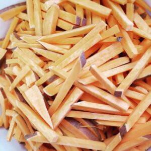 Cut sweet potato fries waiting to be cooked